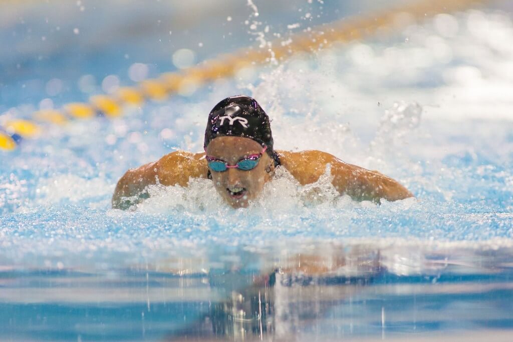 May 15, 2015; Charlotte, NC, USA; Claie Donahue swims the 100 LC Meter Butterfly during the finals at the Mecklenburg County Aquatic Center. Mandatory Credit: Jeremy Brevard-USA TODAY Sports
