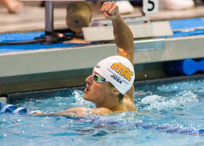 May 15, 2015; Charlotte, NC, USA; Matthew Josa celebrates after winning his heat in the 100 LC Meter Butterfly during the finals at the Mecklenburg County Aquatic Center. Mandatory Credit: Jeremy Brevard-USA TODAY Sports