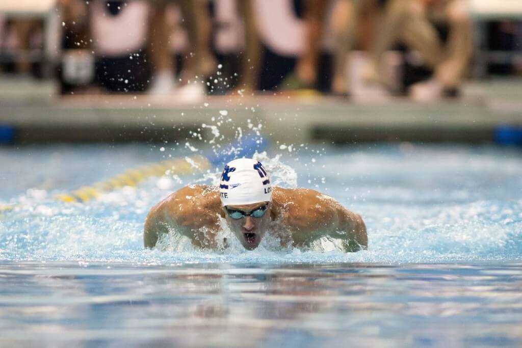 May 15, 2015; Charlotte, NC, USA; Ryan Lochte swims the 100 LC Meter Butterfly during the preliminaries at the Mecklenburg County Aquatic Center. Mandatory Credit: Jeremy Brevard-USA TODAY Sports