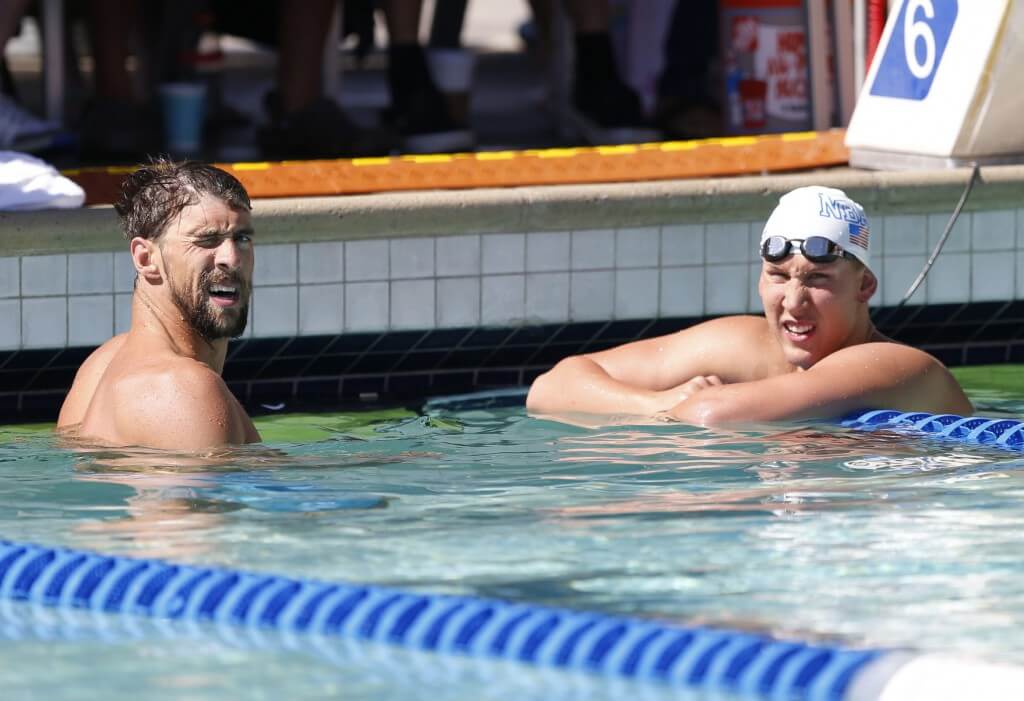 Jun 21, 2015; Santa Clara, CA, USA; Michael Phelps (USA) on left, and Chase Kalisz (USA) check their times after swimming the Men's 200IM Prelim in the final heat during the morning session of day four at the George F. Haines International Swim Center in Santa Clara, Calif. Mandatory Credit: Bob Stanton-USA TODAY Sports