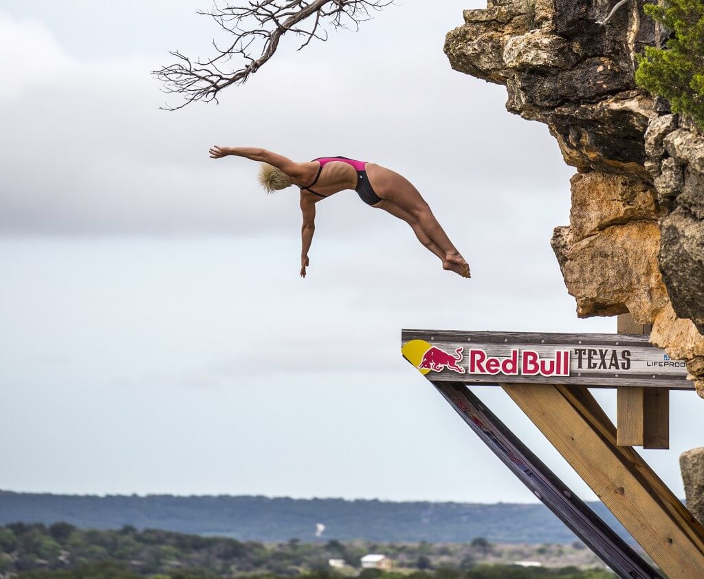 Rachelle Simpson of the USA dives from the 20 metre platform during the third stop of the Red Bull Cliff Diving World Series, Possum Kingdom Lake, Texas, USA on May 29th 2015.
