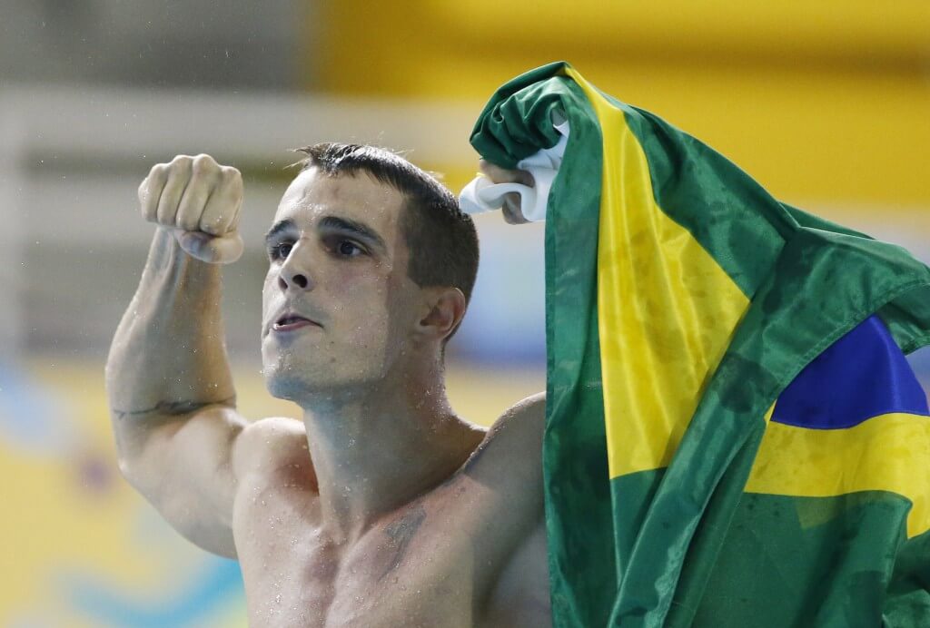 Jul 14, 2015; Toronto, Ontario, CAN; Bruno Fratus of Brazil celebrates as his team wins the men's 4x100m freestyle relay final during the 2015 Pan Am Games at Pan Am Aquatics UTS Centre and Field House. Mandatory Credit: Erich Schlegel-USA TODAY Sports