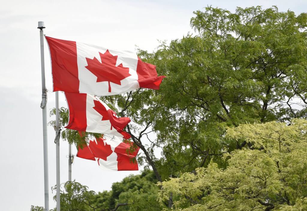 Jul 9, 2015; Toronto, Ontario, Canada; Canadian flags are seen in preparation for the 2015 Pan Am Games. Mandatory Credit: John David Mercer-USA TODAY Sports