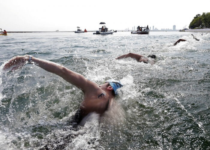 Jul 12, 2015; Toronto, Ontario, CAN; Guillermo Bertola of Argentina competes in the men's open water swim during the 2015 Pan Am Games at Ontario Place West Channel. Mandatory Credit: Erich Schlegel-USA TODAY Sports