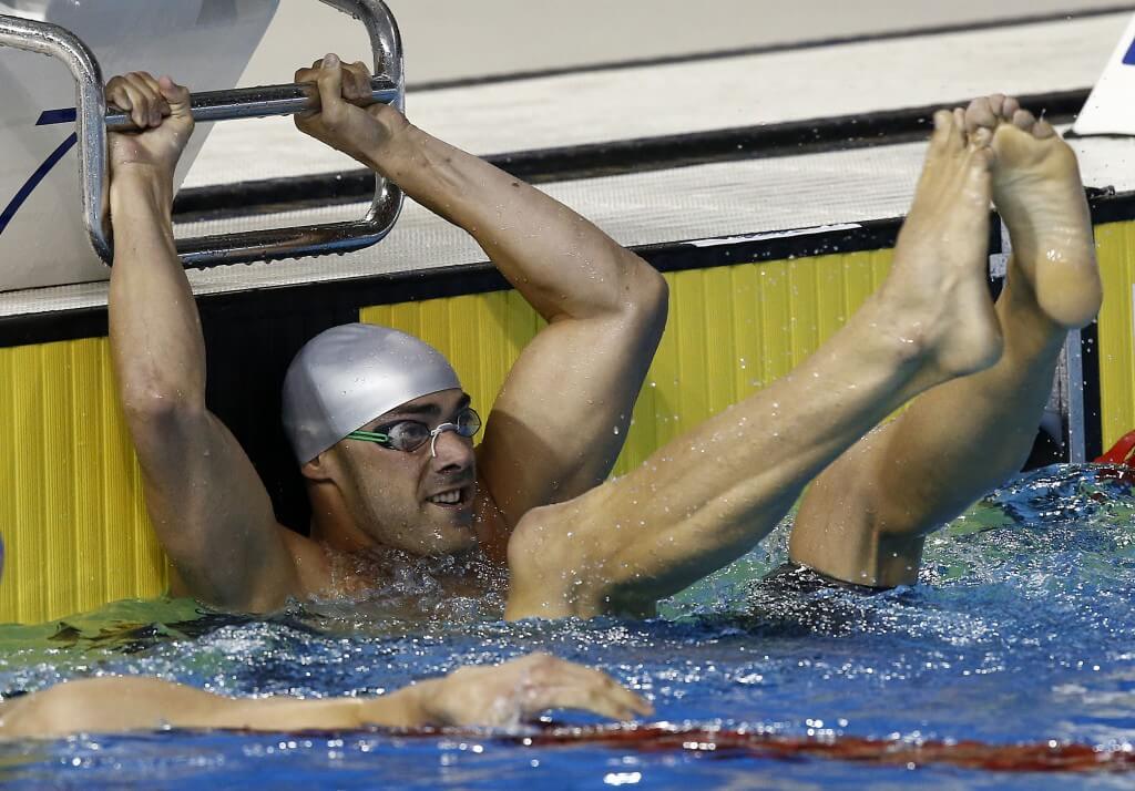 Jul 15, 2015; Toronto, Ontario, CAN; Joao De Lucca of Brazil celebrates after winning in the men’s 200m freestyle final during the 2015 Pan Am Games at Pan Am Aquatics UTS Centre and Field House. Mandatory Credit: Rob Schumacher-USA TODAY Sports