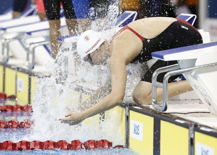 Jul 17, 2015; Toronto, Ontario, CAN; Chantal Van Landeghem splashes water on herself before the women's swimming 50m freestyle preliminary heats during the 2015 Pan Am Games at Pan Am Aquatics UTS Centre and Field House. Mandatory Credit: Rob Schumacher-USA TODAY Sports