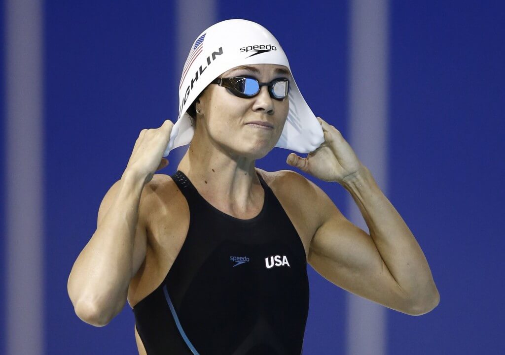 Jul 14, 2015; Toronto, Ontario, CAN; Natalie Coughlin of the United States adjusts her swim cap before the women's 100m freestyle swimming preliminaries during the 2015 Pan Am Games at Pan Am Aquatics UTS Centre and Field House. Mandatory Credit: Rob Schumacher-USA TODAY Sports