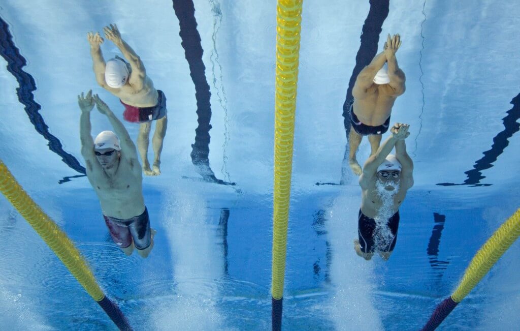 Jul 17, 2015; Toronto, Ontario, CAN; Ryan Cochrane of Canada (left) races Jeremy Bagshaw of Canada (right) in the men's swimming 400m freestyle preliminary heats during the 2015 Pan Am Games at Pan Am Aquatics UTS Centre and Field House. Mandatory Credit: Erich Schlegel-USA TODAY Sports