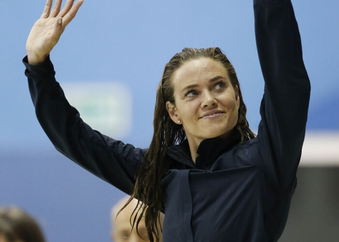 Jul 14, 2015; Toronto, Ontario, CAN; Natalie Coughlin of the United States waves to the crowd after placing second in the women's 100m freestyle swimming final during the 2015 Pan Am Games at Pan Am Aquatics UTS Centre and Field House. Mandatory Credit: Erich Schlegel-USA TODAY Sports