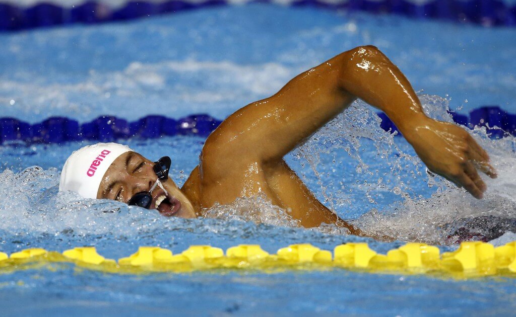 Jul 15, 2015; Toronto, Ontario, CAN; Long Juan Gutierrez of Mexcio computers in the men's 200m freestyle preliminary heat during the 2015 Pan Am Games at Pan Am Aquatics UTS Centre and Field House. Mandatory Credit: Rob Schumacher-USA TODAY Sports