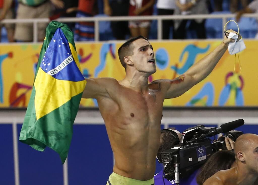 Jul 14, 2015; Toronto, Ontario, CAN; Bruno Fratus of Brazil celebrates after Brazil wins the 4x100m freestyle relay swimming final during the 2015 Pan Am Games at Pan Am Aquatics UTS Centre and Field House. Mandatory Credit: Rob Schumacher-USA TODAY Sports