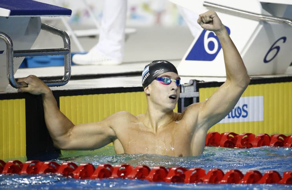 Jul 16, 2015; Toronto, Ontario, CAN; Santiago Grassi of Argentina celebrates after placing second in the men's swimming 100m butterfly final during the 2015 Pan Am Games at Pan Am Aquatics UTS Centre and Field House. Mandatory Credit: Rob Schumacher-USA TODAY Sports