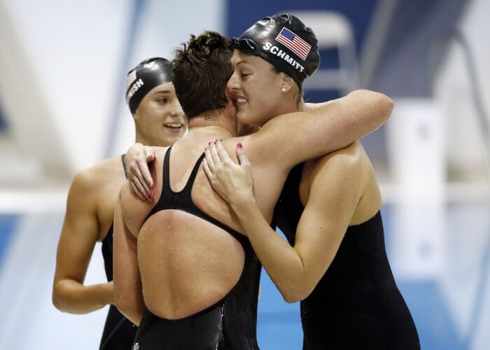 Jul 16, 2015; Toronto, Ontario, CAN; Courtney Harnish , Gillian Ryan and Allison Schmitt of the United States celebrate after winning the women's swimming 4x200m freestyle relay final during the 2015 Pan Am Games at Pan Am Aquatics UTS Centre and Field House. Mandatory Credit: Rob Schumacher-USA TODAY Sports