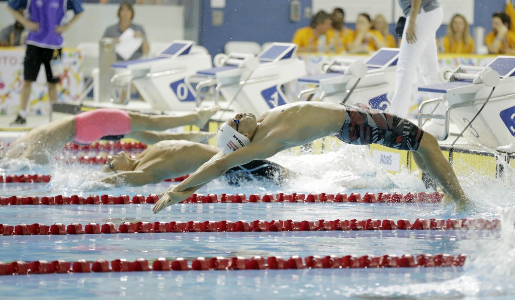 Jul 17, 2015; Toronto, Ontario, CAN; Nicholas Thoman of the United States competes in the men's swimming 100m backstroke preliminary heats during the 2015 Pan Am Games at Pan Am Aquatics UTS Centre and Field House. Mandatory Credit: Erich Schlegel-USA TODAY Sports
