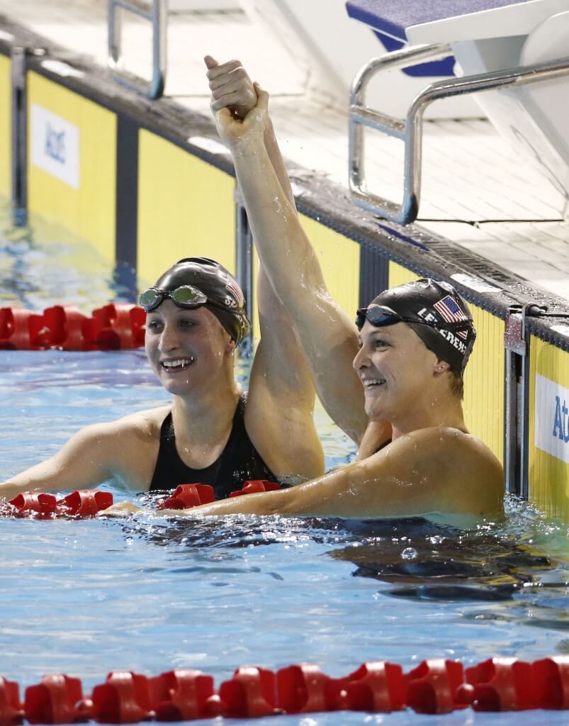 Jul 18, 2015; Toronto, Ontario, CAN; Caitlin Leverenz of the United States (right) celebrates with Meghan Small of the United States (left) after placing first and second respectively in the women's swimming 200m individual medley final during the 2015 Pan Am Games at Pan Am Aquatics UTS Centre and Field House. Mandatory Credit: Rob Schumacher-USA TODAY Sports
