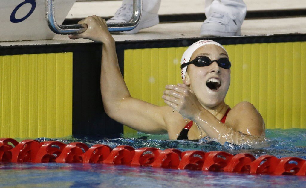 Jul 17, 2015; Toronto, Ontario, CAN; Emily Overholt of Canada celebrates after winning the women's 400m freestyle final the 2015 Pan Am Games at Pan Am Aquatics UTS Centre and Field House. Mandatory Credit: Rob Schumacher-USA TODAY Sports