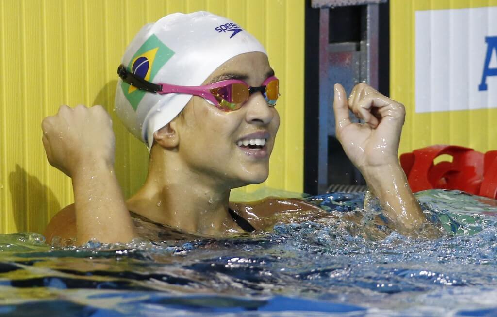 Jul 17, 2015; Toronto, Ontario, CAN; Jhennifer Conceicao of Brazil reacts after the women's swimming 100m breaststroke preliminary heats during the 2015 Pan Am Games at Pan Am Aquatics UTS Centre and Field House. Mandatory Credit: Rob Schumacher-USA TODAY Sports