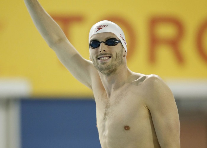 Jul 17, 2015; Toronto, Ontario, CAN; Ryan Cochrane of Canada waves to the crowd before the men's 400m freestyle final the 2015 Pan Am Games at Pan Am Aquatics UTS Centre and Field House. Mandatory Credit: Erich Schlegel-USA TODAY Sports