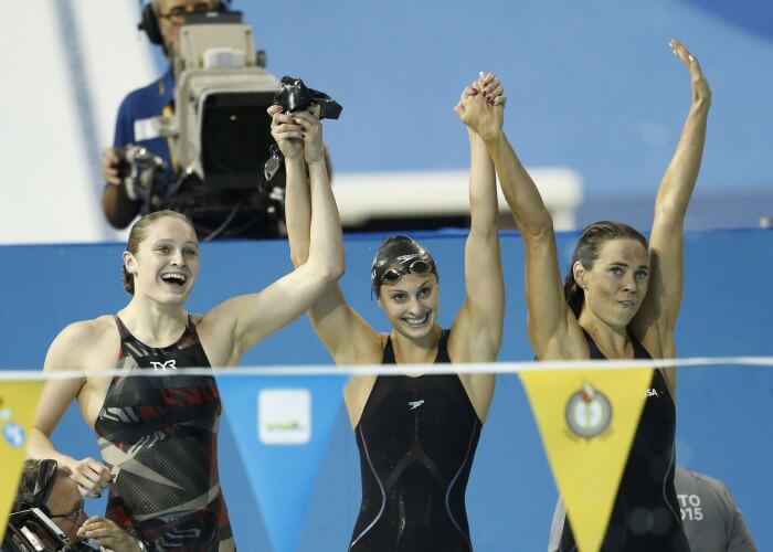 Jul 18, 2015; Toronto, Ontario, CAN; Kelsi Worrell , Katie Meili and Natalie Coughlin of the United States celebrate after winning the women's swimming 4x100m medley final during the 2015 Pan Am Games at Pan Am Aquatics UTS Centre and Field House. Mandatory Credit: Erich Schlegel-USA TODAY Sports