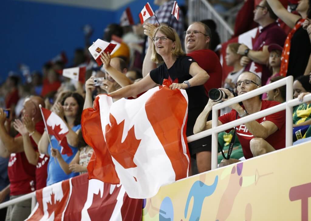 Jul 17, 2015; Toronto, Ontario, CAN; Canada fans wave flags from the stands during the women's 400m freestyle final the 2015 Pan Am Games at Pan Am Aquatics UTS Centre and Field House. Mandatory Credit: Rob Schumacher-USA TODAY Sports