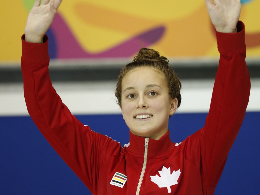 Jul 17, 2015; Toronto, Ontario, CAN; Emily Overholt of Canada on the podium after winning the women's 400m freestyle final the 2015 Pan Am Games at Pan Am Aquatics UTS Centre and Field House. Mandatory Credit: Erich Schlegel-USA TODAY Sports