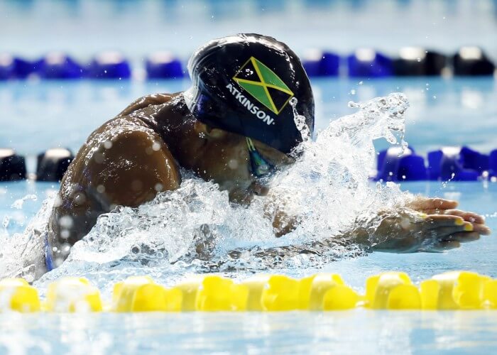 Jul 17, 2015; Toronto, Ontario, CAN; Alia Atkinson of Jamaica competes in the women's 100m breaststroke final the 2015 Pan Am Games at Pan Am Aquatics UTS Centre and Field House. Mandatory Credit: Erich Schlegel-USA TODAY Sports