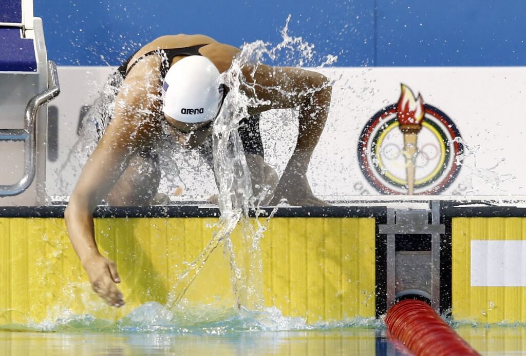 Jul 14, 2015; Toronto, Ontario, CAN; Katherine Mills of the United States splashes water on herself before the women's 200m butterfly swimming preliminaries during the 2015 Pan Am Games at Pan Am Aquatics UTS Centre and Field House. Mandatory Credit: Rob Schumacher-USA TODAY Sports
