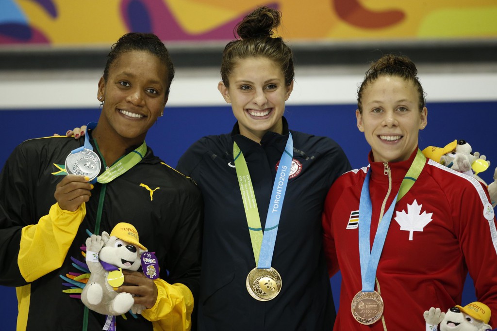 Jul 17, 2015; Toronto, Ontario, CAN; Alia Atkinson of Jamaica (left) , Katie Meili of the United States (middle) and Rachel Nicol of Canada (right) on the podium after the women's 100m breaststroke final the 2015 Pan Am Games at Pan Am Aquatics UTS Centre and Field House. Mandatory Credit: Erich Schlegel-USA TODAY Sports