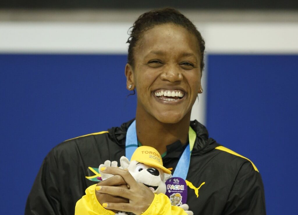 Jul 17, 2015; Toronto, Ontario, CAN; Alia Atkinson of Jamaica celebrates after placing second in the women's 100m breaststroke final the 2015 Pan Am Games at Pan Am Aquatics UTS Centre and Field House. Mandatory Credit: Erich Schlegel-USA TODAY Sports