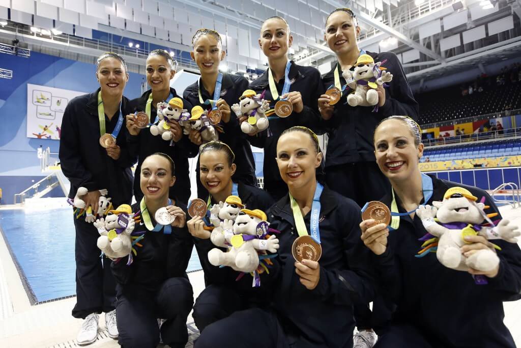 Jul 11, 2015; Toronto, Ontario, CAN; The United States celebrates winning the bronze medal in team synchronized swimming during the 2015 Pan Am Games at Pan Am Aquatics UTS Centre and Field House. Mandatory Credit: Rob Schumacher-USA TODAY Sports