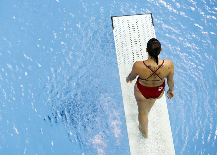 Jul 13, 2015; Toronto, Ontario, USA; Pamela Ware of Canada prepares for a dive in the women's synchronised diving 3m springboard final the 2015 Pan Am Games at Pan Am Aquatics UTS Centre and Field House. Mandatory Credit: Rob Schumacher-USA TODAY Sports