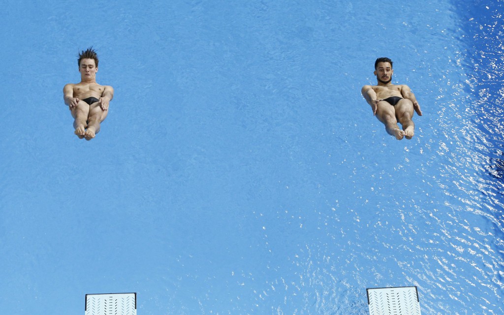 Jul 13, 2015; Toronto, Ontario, USA; Philippe Gagne and Francois Imbeau-Dulac of Canada compete in the men's synchronised diving 3m springboard final the 2015 Pan Am Games at Pan Am Aquatics UTS Centre and Field House. Mandatory Credit: Rob Schumacher-USA TODAY Sports