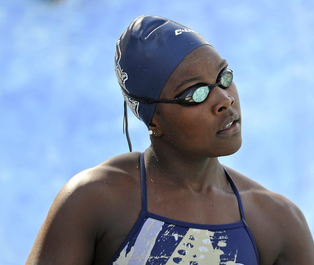 30 January 2016: FIU's Naomi Ruele prepares to compete in the 100 yard freestyle as the FIU Golden Panthers faced the University of Miami Hurricanes at the Biscayne Bay Campus Aquatics Center in Miami, Florida.