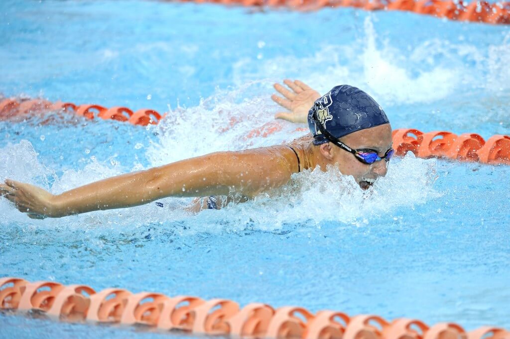 31 January 2015: FIU's Valerie Inghels competes in the 100 yard butterfly as the FIU Golden Panthers competed against the University of Miami at the University Center Swimming Pool in Coral Gables, Florida.