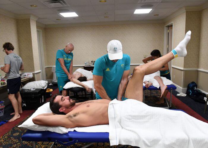 The Physio team working on the Australian Team Members inbetween training sessions. University of Auburn Aquatic Centre, Alabama USA. Australian Olympic Swimming Team are in their final training staging Camp before heading over to the Rio2016 Olympic Games. July 30 2016. Photo by Delly Carr. Pic credit mandatory for complimentary exclusive editorial usage. Thank You.