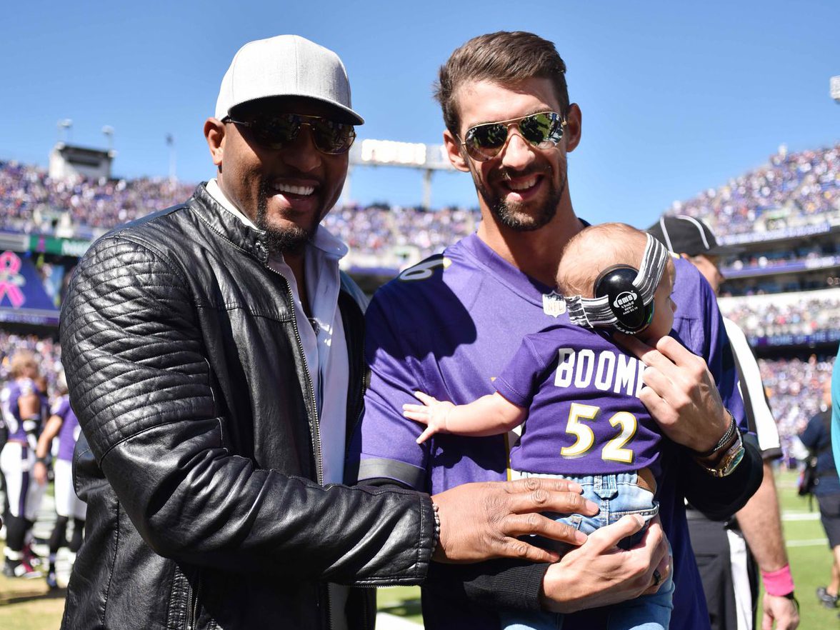 Michael Phelps Leads Baltimore Ravens On To Field