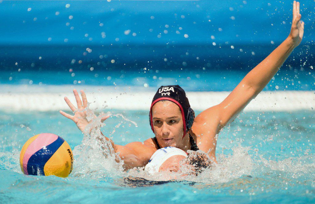 epa06091016 Rachel Fattal (rear) of the US challenges Carly Joy Faulmann of South Africa for the ball during the women's water polo Group B first round match between South Africa and the USA of the FINA Swimming World Championships 2017 in Budapest, Hungary, 16 July 2017. EPA/SZILARD KOSZTICSAK HUNGARY OUT