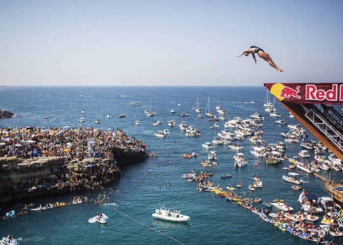 Cesilie Carlton of the USA dives from the 21 metre platform during the first competition day of the third stop of the Red Bull Cliff Diving World Series at Polignano a Mare, Italy on 23 July 2017. // Romina Amato/Red Bull Content Pool // P-20170723-01392 // Usage for editorial use only // Please go to www.redbullcontentpool.com for further information. //