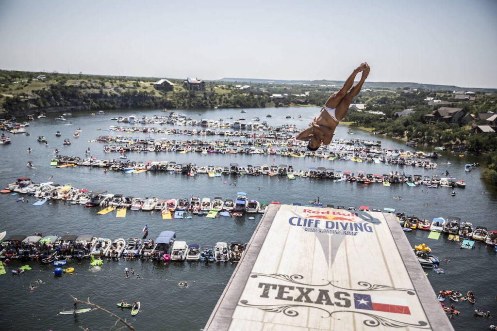 Jonathan Paredes of Mexico dives from the 27 metre platform during the fourth stop of the Red Bull Cliff Diving World Series at Possum Kingdom Lake, Texas, USA on September 3, 2017. // Romina Amato/Red Bull Content Pool // P-20170904-03590 // Usage for editorial use only // Please go to www.redbullcontentpool.com for further information. //