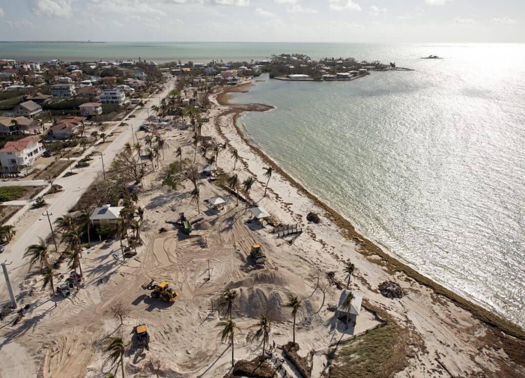 Workers use front-end loaders to restore Sombrero Beach Sunday, Oct. 1, 2017, in Marathon, Fla. Sunday marked the first day, since Hurricane Irma passed through the Florida Keys on Sept. 10, that Keys officials gave the green light for visitors to return to the island chain. While Key Largo and Key West were least impacted, other areas of the Keys, including Marathon, are still recovering. FOR EDITORIAL USE ONLY (Andy Newman/Florida Keys News Bureau/HO)