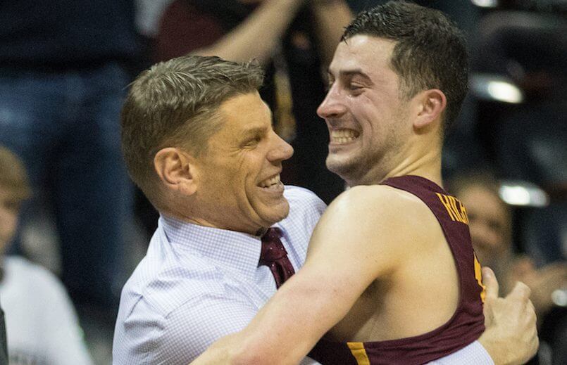 Loyola University Chicago Head Coach Porter Moser and junior Ben Richardson embrace after defeating Kansas State in the Elite Eight round of the NCAA Tournament at Philips Arena in Atlanta, GA., on Saturday, March 24, 2018. (Photo: Lukas Keapproth)