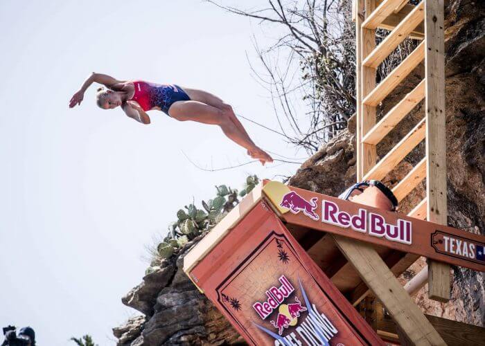 Rhiannan Iffland of Australia dives from the 21 metre platform during the final competition day of the first stop at the Red Bull Cliff Diving World Series in Possum Kingdom Lake, Texas, USA on June 2, 2018. // Dean Treml/Red Bull Content Pool // AP-1VUY3NFC52111 // Usage for editorial use only // Please go to www.redbullcontentpool.com for further information. //