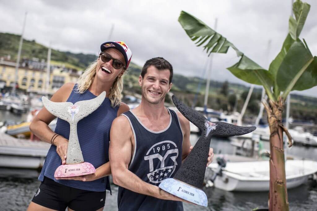 Steven LoBue of the USA and Rhiannan Iffland of Australia pose for a photo with their winners trophies at the marina on Sao Miguel after the final competition day of the third stop at the Red Bull Cliff Diving World Series in Azores, Portugal on July 14, 2018. // Dean Treml/Red Bull Content Pool // AP-1W9B3VUPH2111 // Usage for editorial use only // Please go to www.redbullcontentpool.com for further information. //