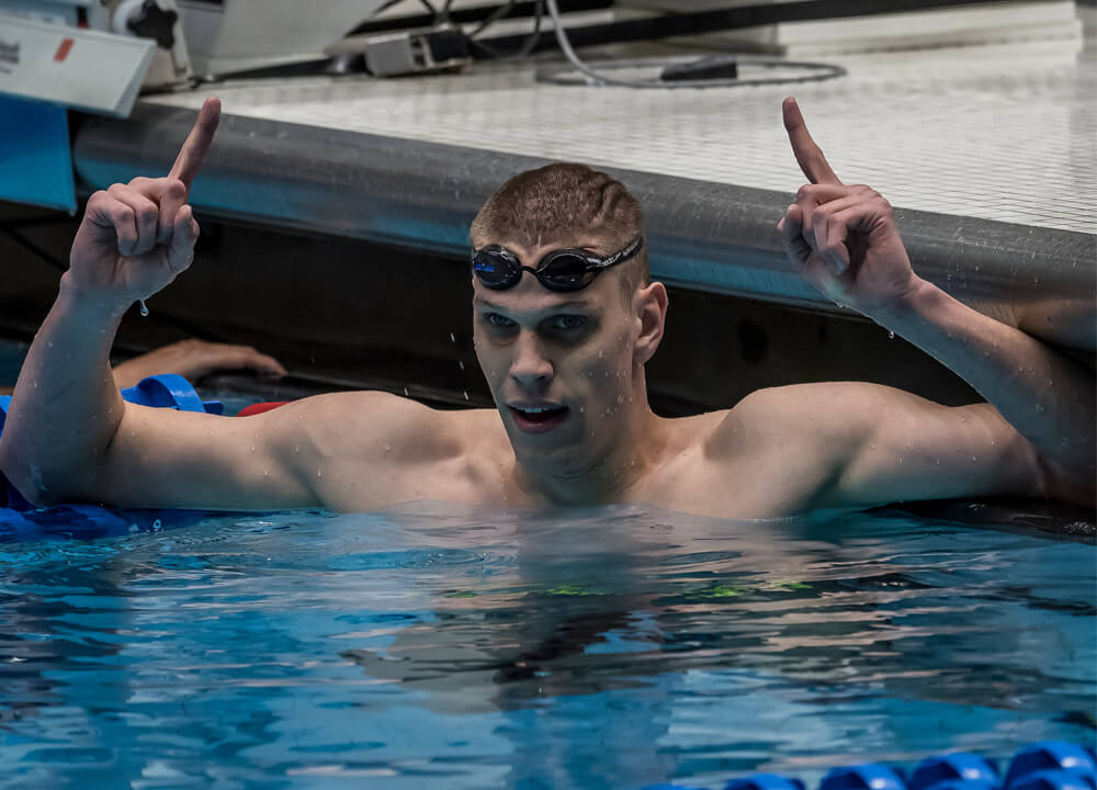 01 LEAD-IN-NCAA2-alex-kunert-queens-by-phb NCAA Division I Swimming and Diving Mens 2019 Still No. 1