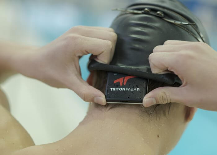 Swimming Technology TritonWear training device on swimmer's head