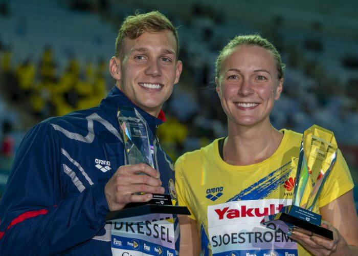Caeleb Dressel (L) of the United States of America (USA) and Sarah Sjoestroem of Sweden pose with the trophy for the best male and female swimmer at the Swimming events at the Gwangju 2019 FINA World Championships, Gwangju, South Korea, 28 July 2019.