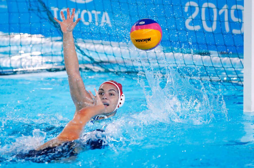 Lima, Monday, August 5, 2019 - USA ’s Stephanie Haralabidis, left, scores a goal past goalkeeper Victoria Chamorro from Brazil during the Women’s Preliminary Group A Water Polo match at the Polideportivo Villa Maria del Triunfo at the Pan American Games Lima 2019. Copyright Marcos Brindicci / Lima 2019 Mandatory credits: Lima 2019 ** NO SALES ** NO ARCHIVES **