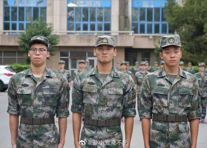 Xu Jiayu, centre, on traditional military camp with teammates last month. Photo Courtesy: Weibo