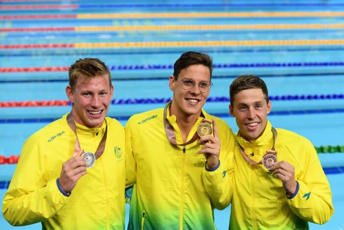 GOLD COAST, AUSTRALIA - APRIL 09: (L-R) Silver medalist Bradley Woodward of Australia, gold medalist Mitch Larkin of Australia and bronze medalist Josh Beaver of Australia pose during the medal ceremony for the Men's 200m Backstroke Final on day five of the Gold Coast 2018 Commonwealth Games at Optus Aquatic Centre on April 9, 2018 on the Gold Coast, Australia. (Photo by Quinn Rooney/Getty Images)