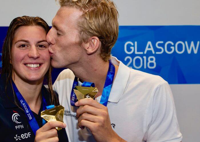 Jeremy DESPLANCHES (R) of Switzerland and his girlfriend Charlotte BONNET of France pose with their gold medals after wining the men's 200m Individual Medley (IM) Final and the women's 200m Freestyle Final during the 34th LEN European Swimming Championships in Glasgow, Great Britain, Monday, Aug. 6, 2018. (Photo by Patrick B. Kraemer / MAGICPBK)